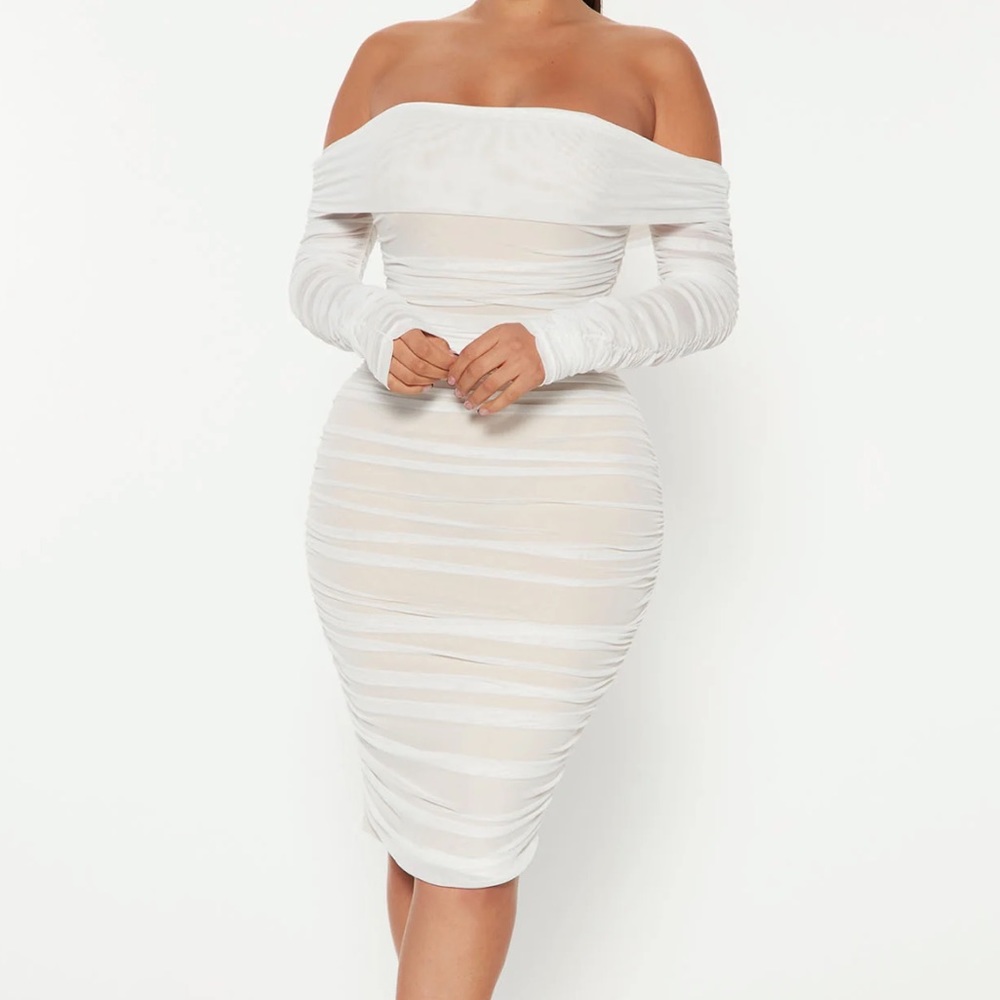 Never worn white dress perfect for wedding events or for an outing